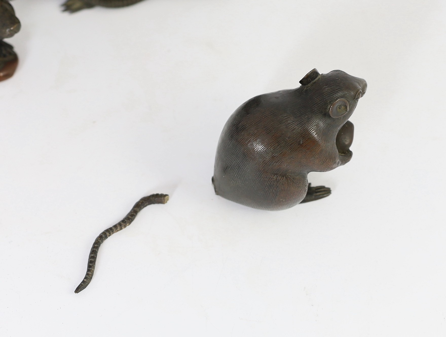 An assembled group of five Japanese bronze and mixed metal models of rats, Meiji period, smallest 9.5cm long, largest 16.5cm long, one small rat tail detached